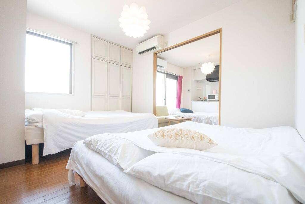 Sanacion Motomachi 7 なんばで150平米の広々空間 最大14名 Netflix見れます Apartment *